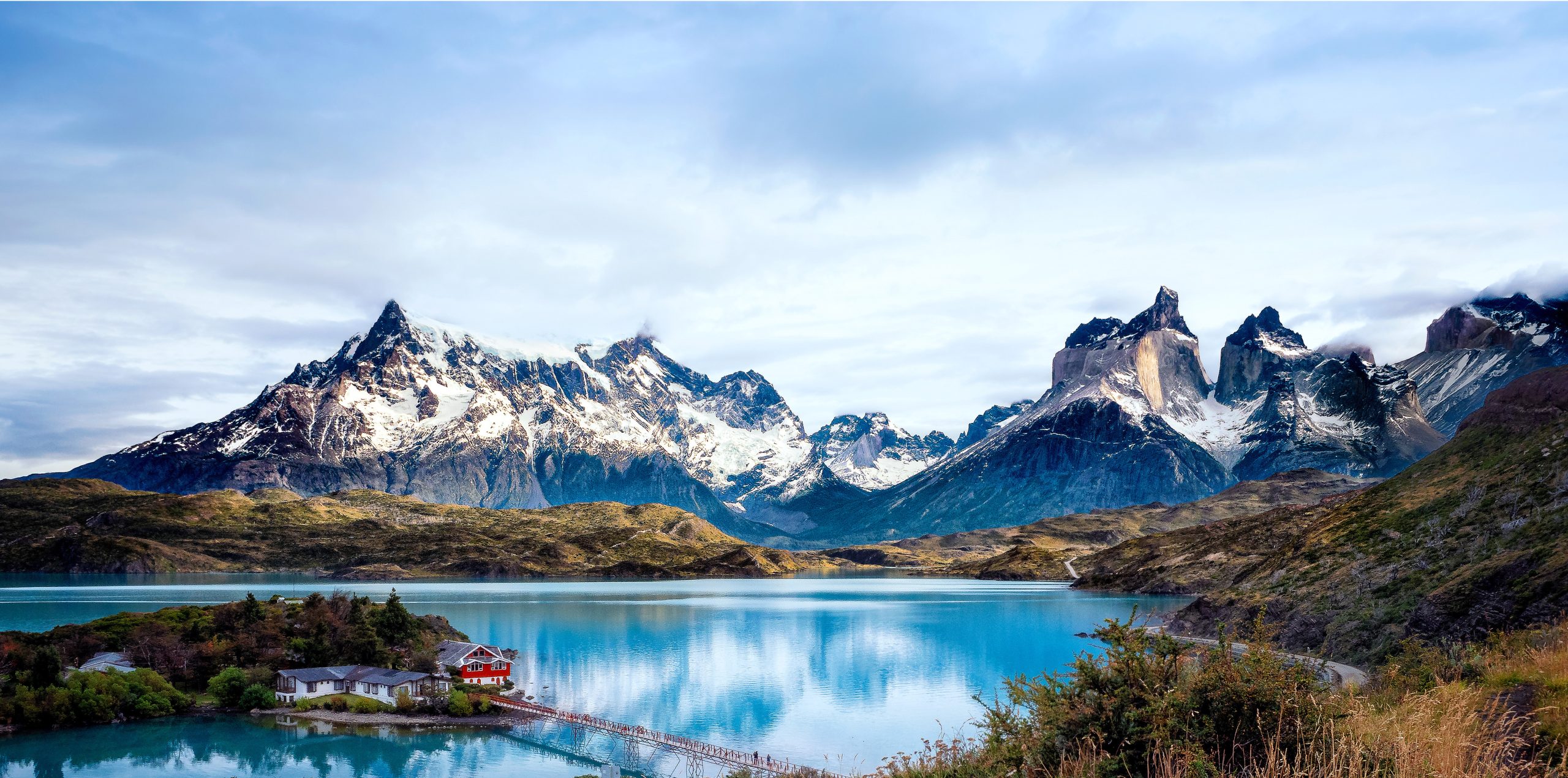 This image invites visitors to imagine traveling to Lake Pehoé in Chile's Patagonia. 