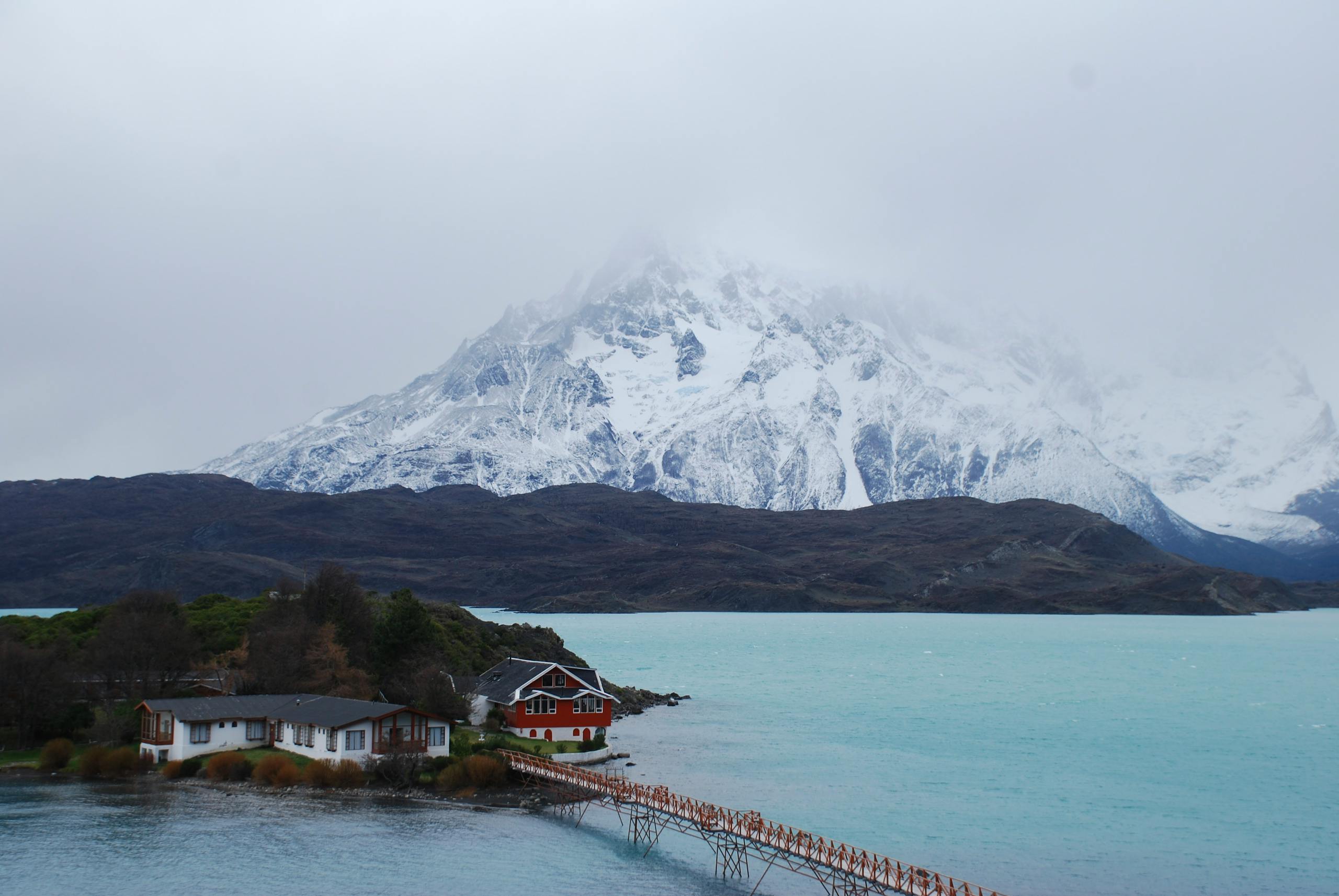 Majestic mountains and serene lake in Torres del Paine National Park, Chile, during winter.